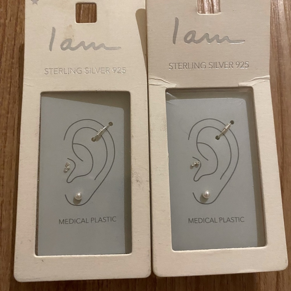 TWO earrings sets with tragus studs